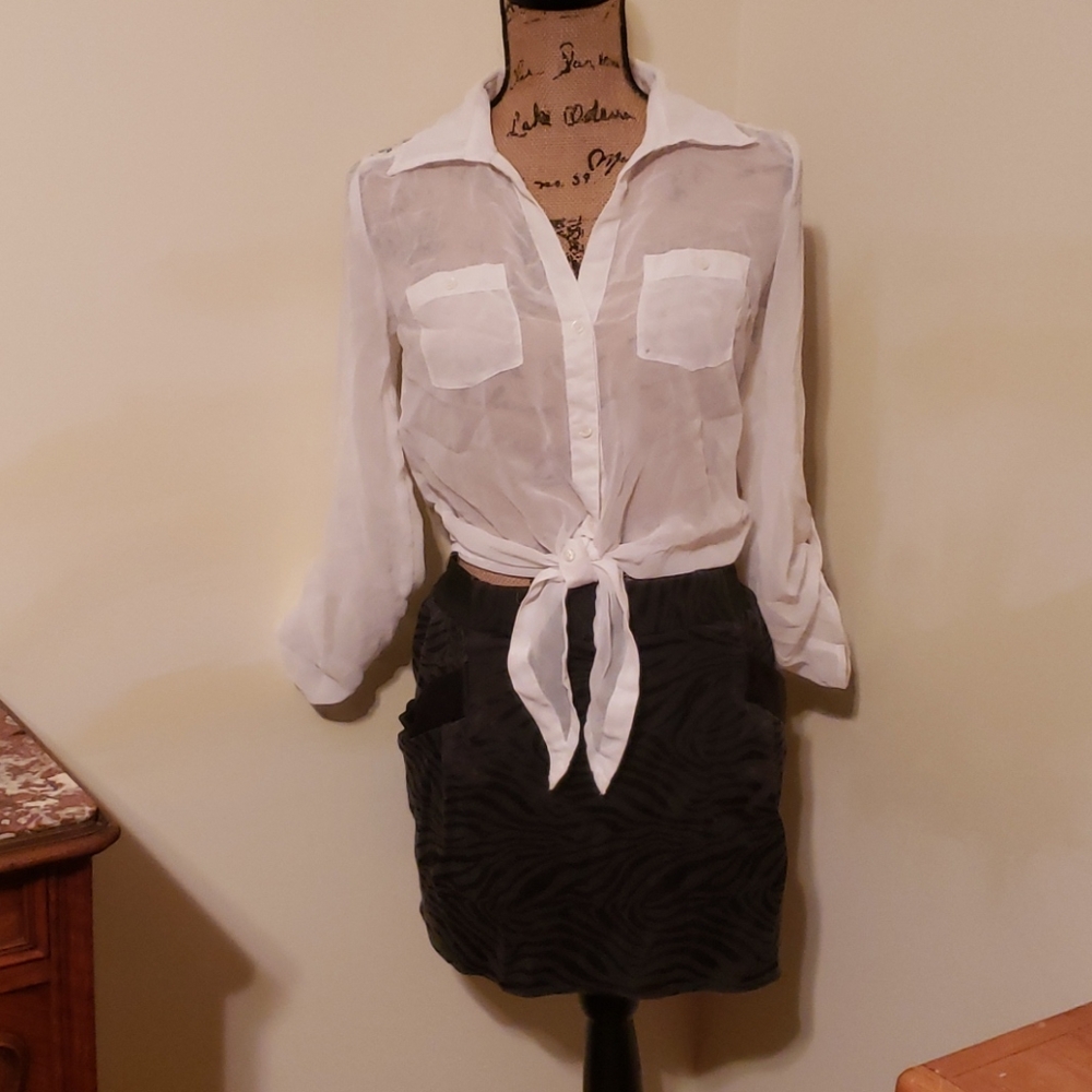 Black zebra print mini skirt.